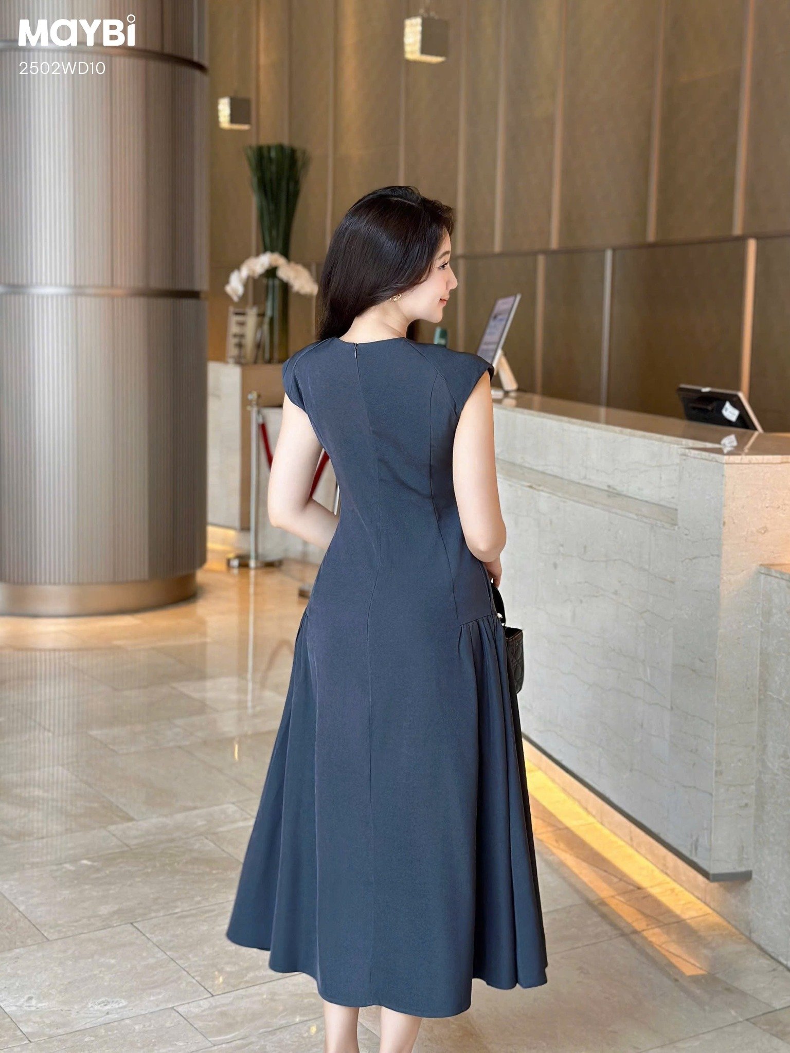 Đầm xòe chéo nhung hàn tùng rã nhún dáng midi