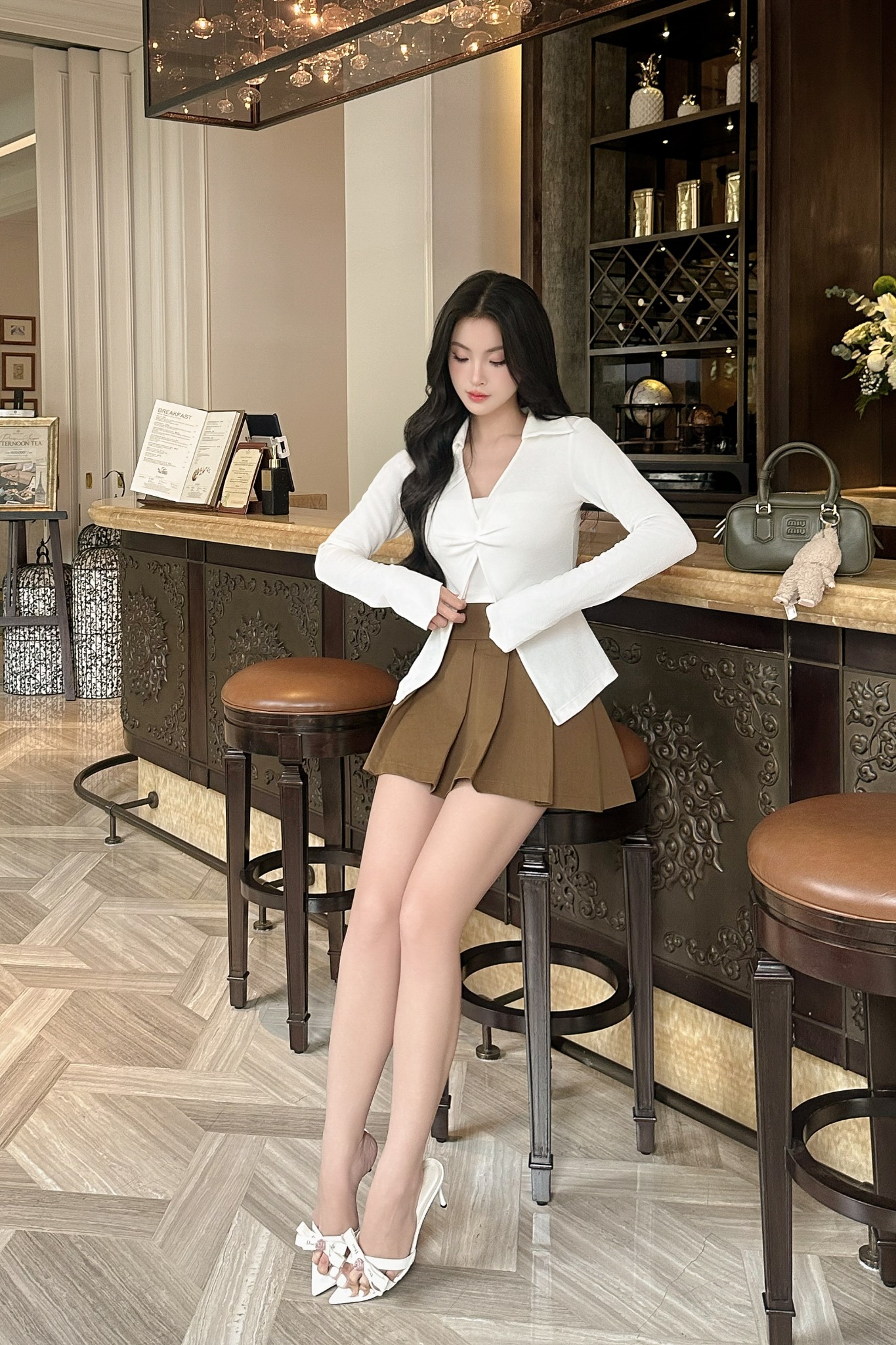 Chân váy xòe xếp ly dáng mini