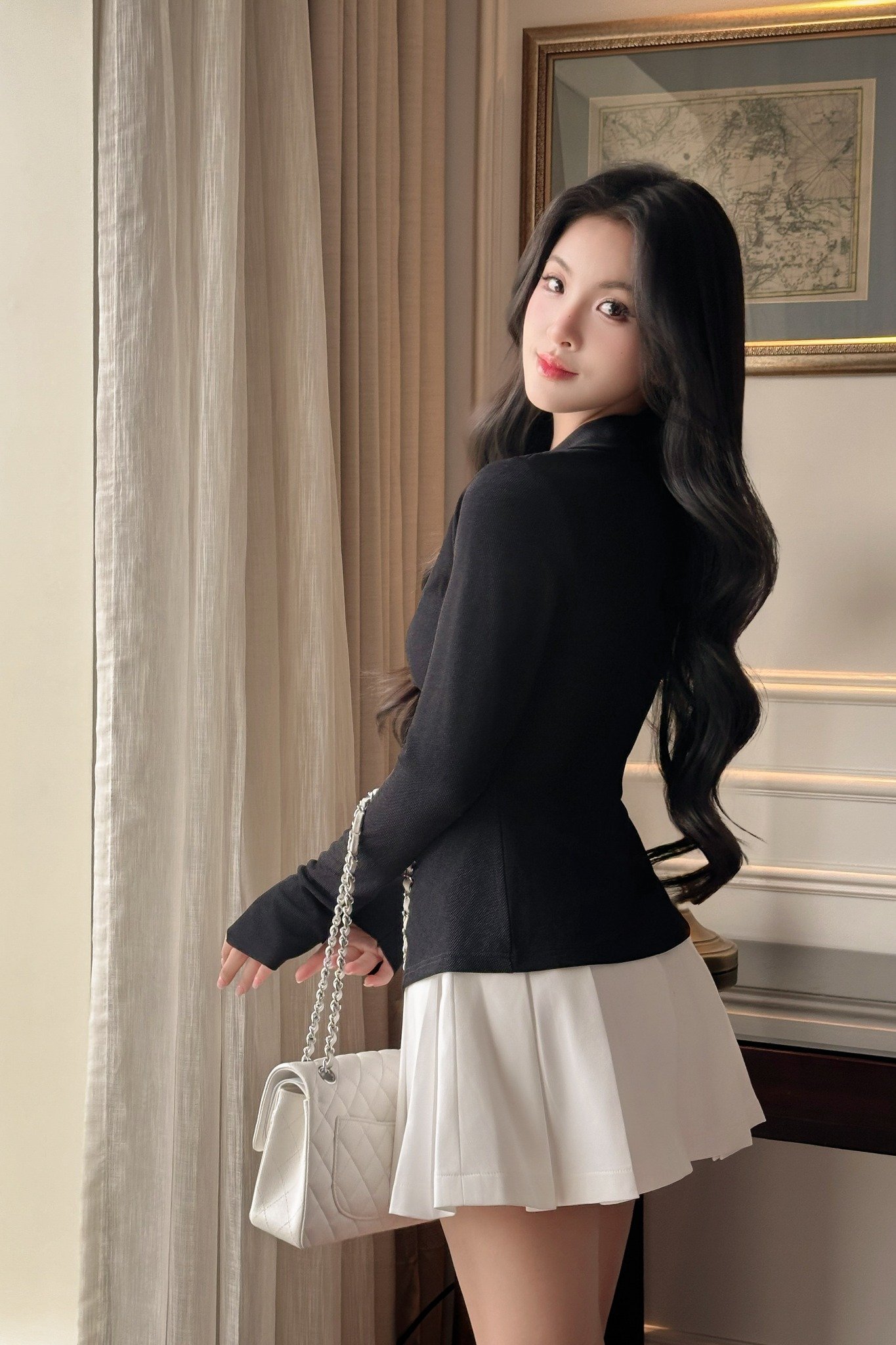 Chân váy xòe xếp ly dáng mini