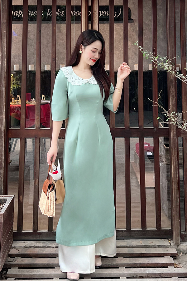 Áo dài ôm lụa xanh mint phối cổ ren trắng